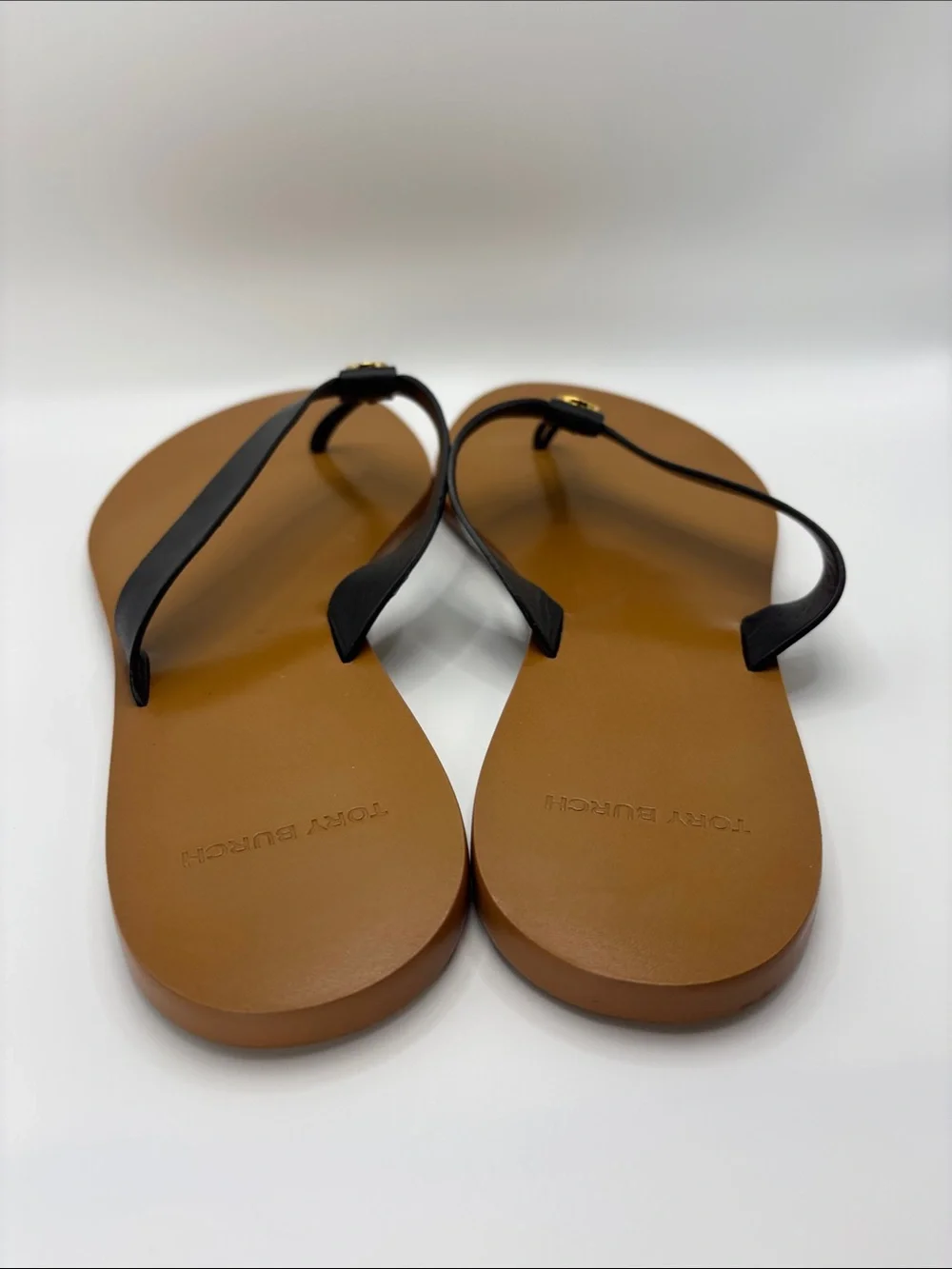 Tory Burch Black and Tan Leather Flip Flop Sandals